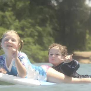 Our 4 and 6 year old loving their surf lesson with Suzy!
