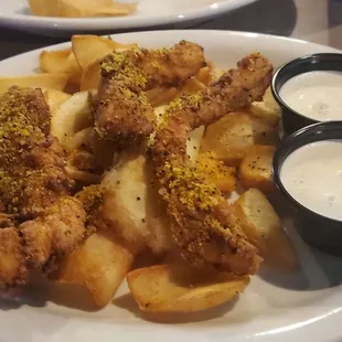 Lemon pepper chicken fingers and fries