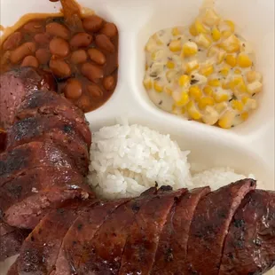 Sausage plate with creamed corn and bean