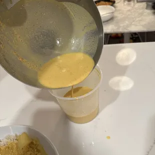 Returning the liquid to show no veggies