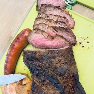 Grid iron chicken, tri tip and smoked hot links! All delicious!! Must try!!