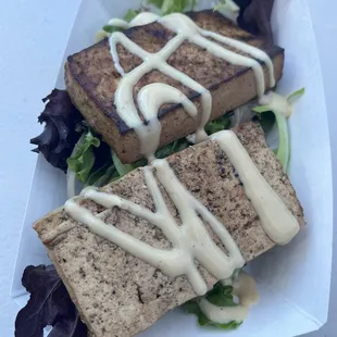 Tofu with a sesame dressing.
