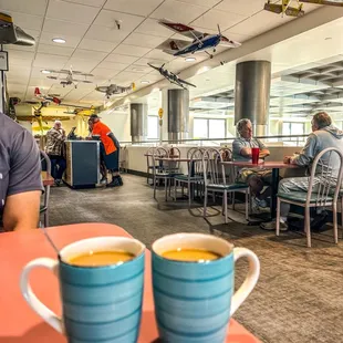 two cups of coffee on a table