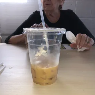 My grandma and I! She&apos;s eating a donut and I&apos;m having my coffee!