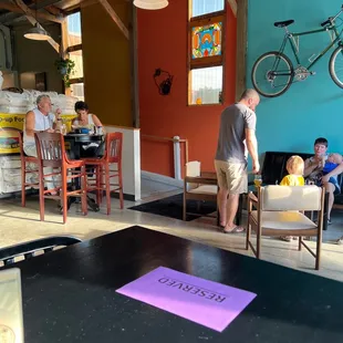 Seating in the back and out of doors.