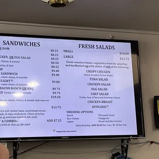 a menu displayed on a large screen
