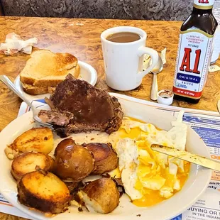 Boneless ribeye medium, homefried potatoes,  two eggs over medium coffee wheat toast  fantastic
