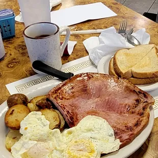 04/05/23 Oh yeah ham steak and eggs fried potatoes toast cawfee hasn't changed  Get you some of that