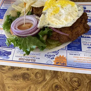 Tenderloin burger and egg and mega breakfast.