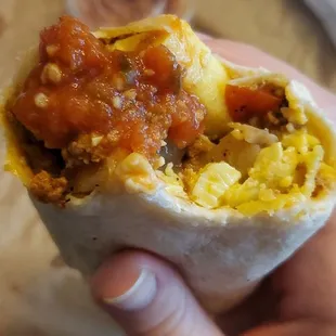 Inside the burrito - egg, cheese, potato and meat