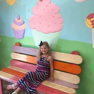 We love when kids visit and get a picture on our pop sickle stick bench!