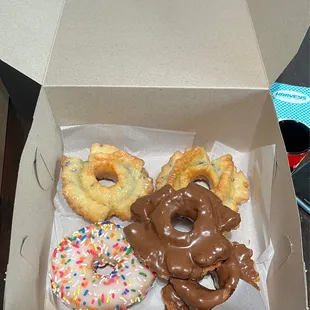 a variety of donuts in a box