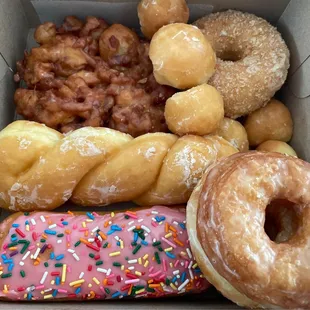 a variety of donuts in a box