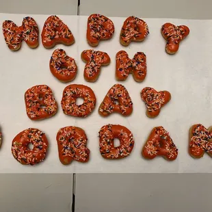 the words happy birthday spelled in sprinkles