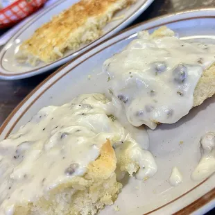 Biscuit with gravy. Added hash browns