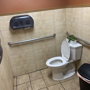Bathroom was simple and clean. Handicap friendly.