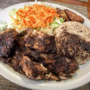 The Jerk Chicken with salad, plantains, and rice &amp; peas.