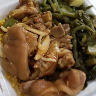 Pig feet with collard greens and green beans with potato.