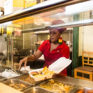 a woman serving food