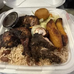 Jerk Chicken, Rice &amp; Peas..... Also fried plantains......