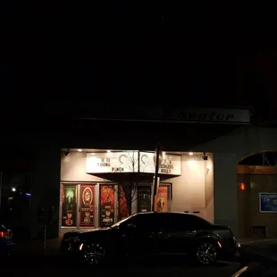 a car parked in front of the building