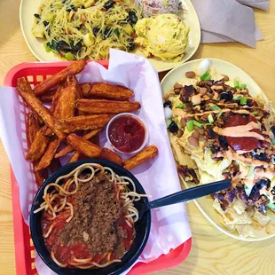 Spaghetti, sweet potato fries, black bean nachos, and a 3 side plate (almond pate, potato salad, bean thread)