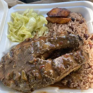 Curry Red Snapper,  red beans and rice, plantain, and cabbage.