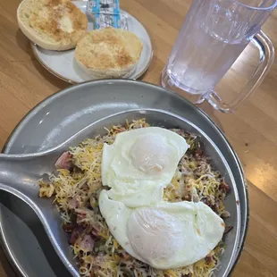 Meat lovers Skillet with mushrooms and jalapeno added, over easy eggs