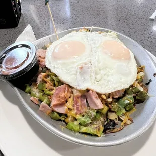 Skillet with basted eggs.