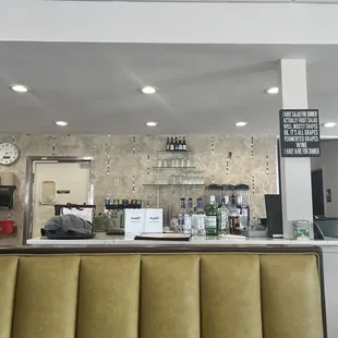 Classic diner seating and bar near kitchen