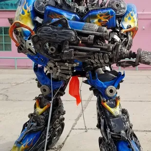 This is a transformer made of car parts outside the Sunset Silver location! So cool!