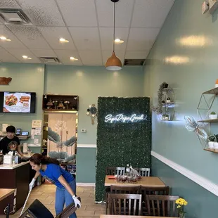 Very clean restaurant. As you can see the aunty cleaning up.