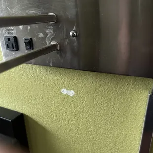 Missing paint and weird smudges on stainless steal light post