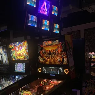 a row of pinball machines