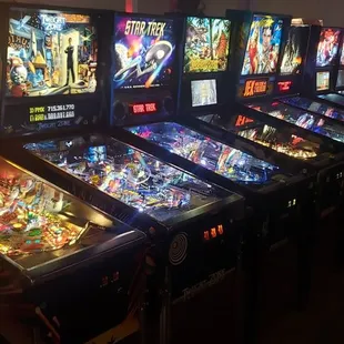 a row of pinball machines