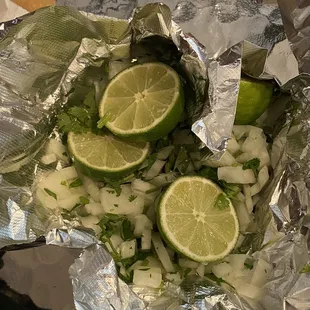 Cilantro/Onion topping and fresh Limes.