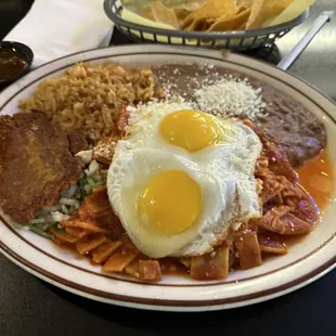 Chilaquiles with red sauce and I added the house made chorizo! Phenomenal