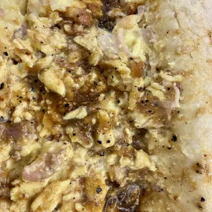 Supposedly, a bacon &amp; egg breakfast taco.  Undercooked with "pseudo bacon."