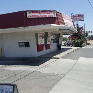 a sign in front of a restaurant