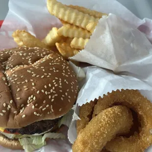 1/4 LB. Super Combo meal with a side of onion rings