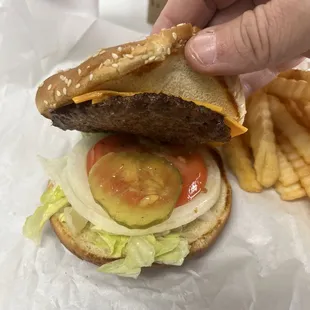 Razor thin patty and a floppy pickle