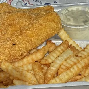 Catfish Plate w/ fries, a couple onion rings, and two hush puppies