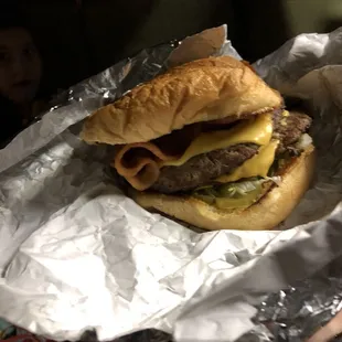 a person sitting in the back seat of a car