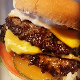 a close up of a hamburger