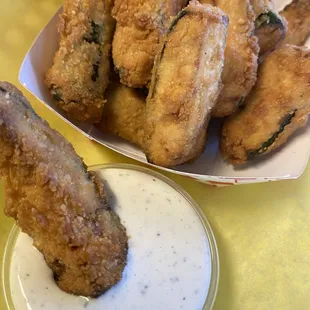 HAND CUT AND BATTERED DEEP FRIED ZUCCHINI FRYS  WITH IN HOUSE HAND MADE RANCH DRESSING
