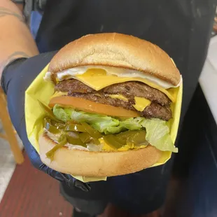 DOUBLE JALAPENO CHEESE BURGER  WITH BURGER SAUCE AMERICAN CHEESE LETTUCE TOMATO PICKLES ONIONS &amp; JALAPENOS