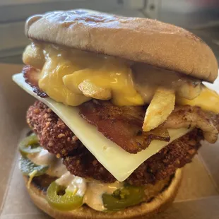 Hot Cheeto  Fried Chicken  Sandwich ,  has  Spicy Sauce  Jalapenos Pepper Jack Cheese  Bacon Fry&apos;s Nacho Cheese s   PLEASE BE WARNED THIS