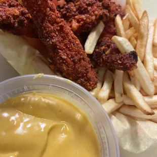 HOT CHEETO CHICKEN STRIPS HAND CUT SEASONED &amp; BATTERED DEEP FRIED  WITH NACHO CHEESE SAUCE  COMES IN 3 &amp; 5 PC.