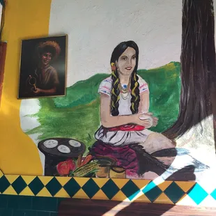 Murals adorn the walls.