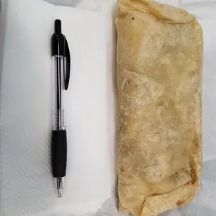 a pen and a napkin on a table